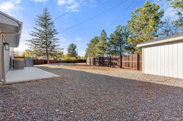 view of yard featuring central AC