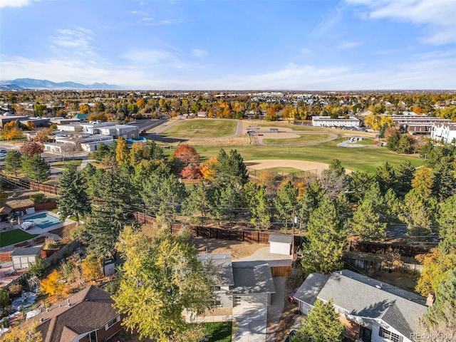 birds eye view of property featuring a mountain view