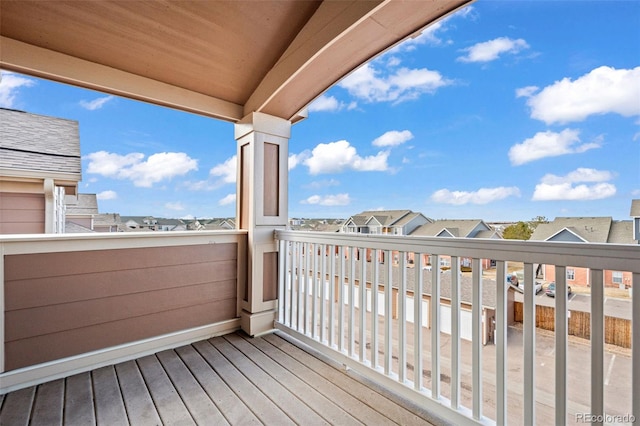 wooden terrace featuring a residential view