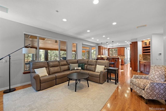 living room with light wood-type flooring