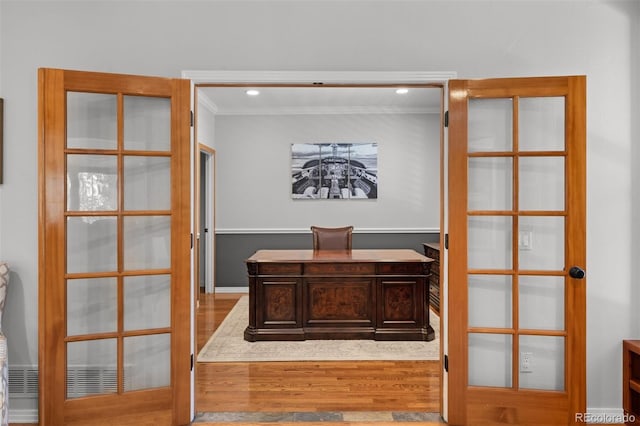 office area featuring crown molding and hardwood / wood-style floors