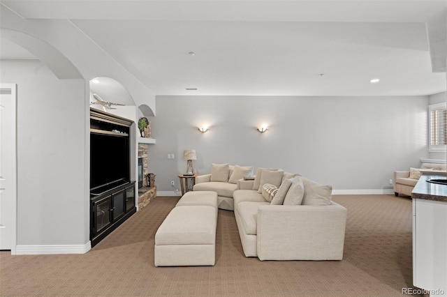 living room featuring light colored carpet