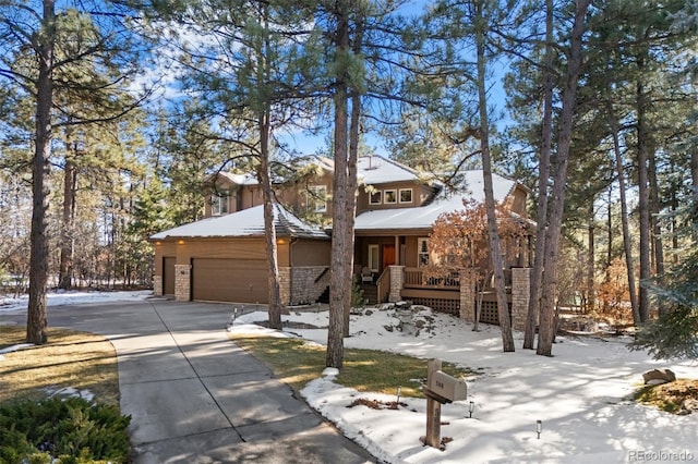 view of front of house with a garage and a porch