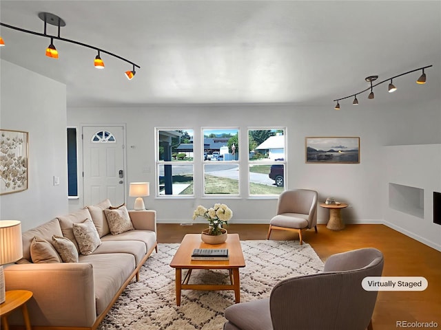 4416 S Vivian St, Morrison, CO 80465 - living room featuring track lighting and wood finished floors