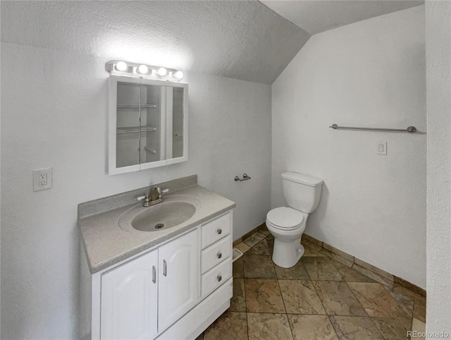 4416 S Vivian St, Morrison, CO 80465 - bathroom with vanity, lofted ceiling, and a textured ceiling