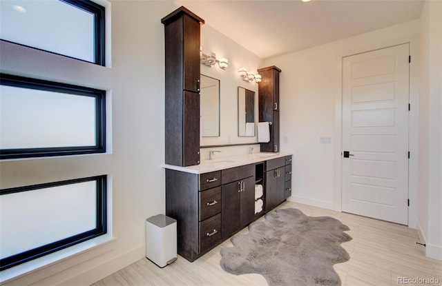 4224 E Dickenson Pl, Denver, CO 80222 - full bath featuring double vanity and baseboards