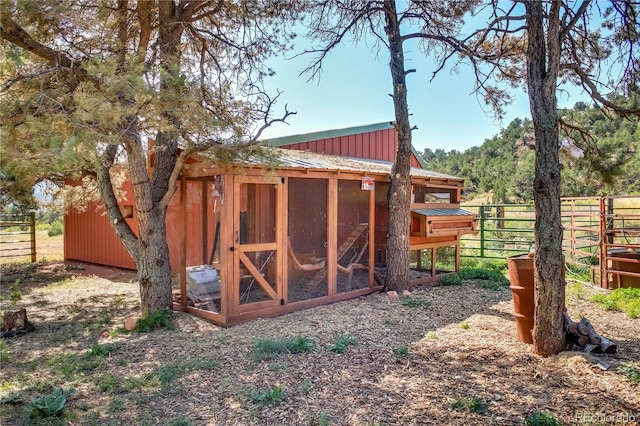 view of poultry coop with fence