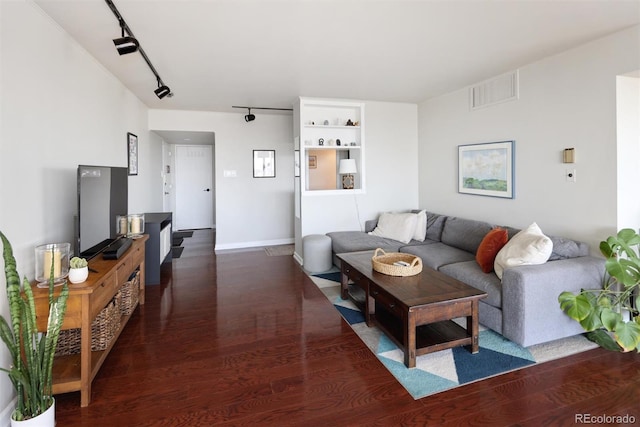 790 N Washington St Unit 1210, Denver, CO 80203 - living area featuring rail lighting and wood finished floors