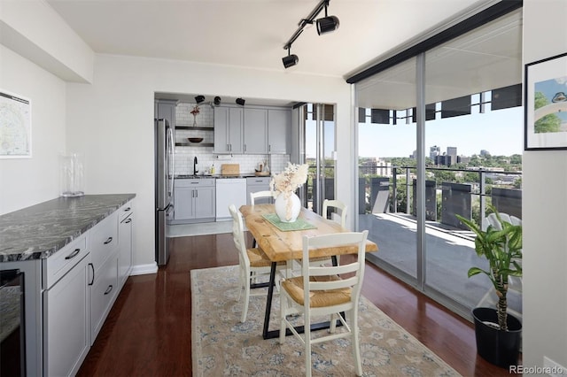 790 N Washington St Unit 1210, Denver, CO 80203 - dining room with dark wood finished floors