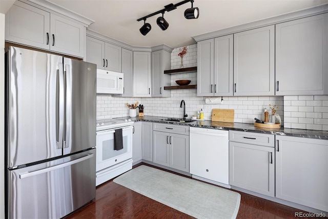 790 N Washington St Unit 1210, Denver, CO 80203 - kitchen with white appliances, open shelves, dark stone counters, and tasteful backsplash