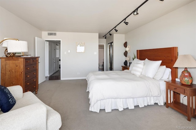 790 N Washington St Unit 1210, Denver, CO 80203 - bedroom with carpet and rail lighting