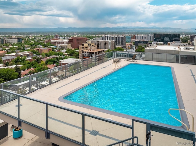 790 N Washington St Unit 1210, Denver, CO 80203 - community pool featuring a view of city and a mountain view