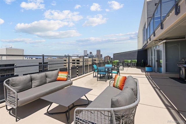 790 N Washington St Unit 1210, Denver, CO 80203 - view of patio with an outdoor living space, a skyline view, outdoor dining area, and grilling area