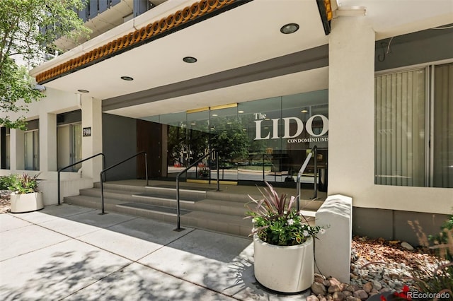 790 N Washington St Unit 1210, Denver, CO 80203 - doorway to property featuring stucco siding