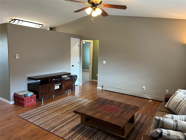 living room featuring a baseboard radiator, lofted ceiling, hardwood / wood-style floors, and ceiling fan