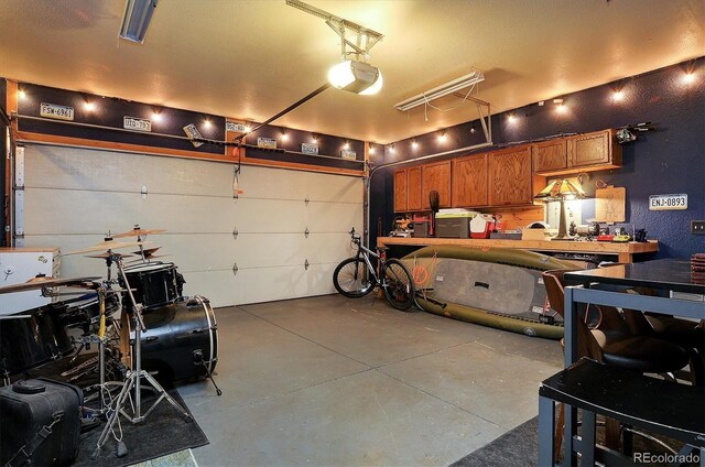 garage featuring a garage door opener