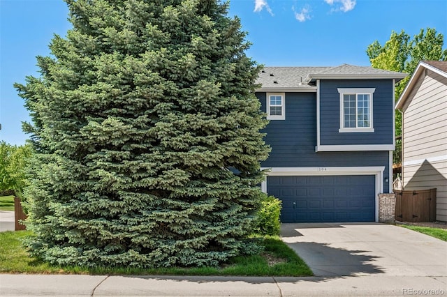 104 Willowick Cir, Highlands Ranch, CO 80129 - view of front of home featuring concrete driveway and a garage