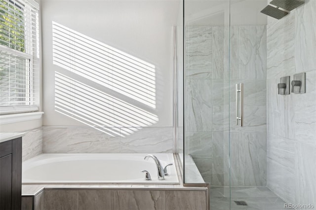 104 Willowick Cir, Highlands Ranch, CO 80129 - full bathroom featuring plenty of natural light, a garden tub, and a marble finish shower
