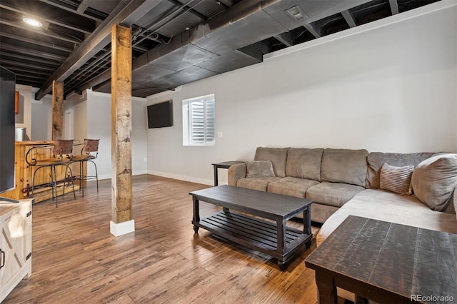 104 Willowick Cir, Highlands Ranch, CO 80129 - living area with wood finished floors and baseboards