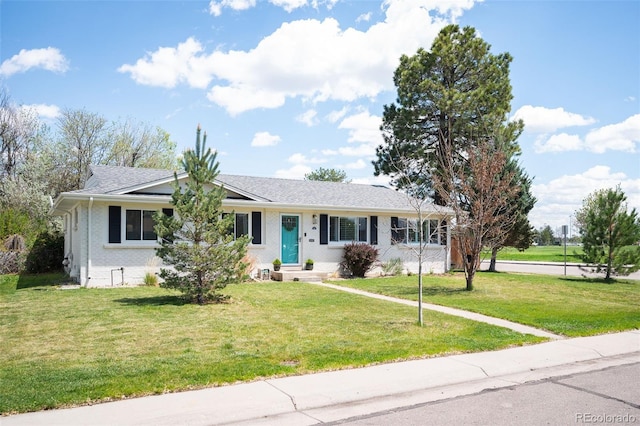 986 S Jersey St, Denver, CO 80224 - ranch-style house with a front lawn and brick siding