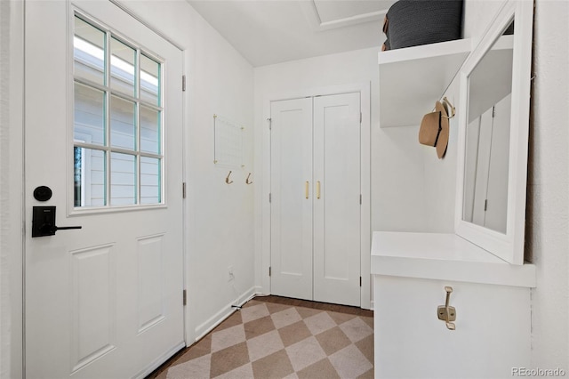986 S Jersey St, Denver, CO 80224 - mudroom featuring light floors and baseboards