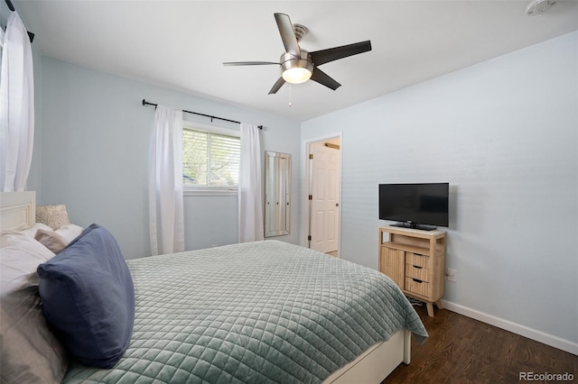 986 S Jersey St, Denver, CO 80224 - bedroom with dark wood-type flooring, baseboards, and a ceiling fan