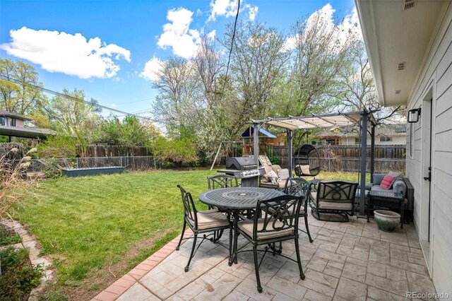 986 S Jersey St, Denver, CO 80224 - view of patio featuring a playground, area for grilling, an outdoor hangout area, and outdoor dining area