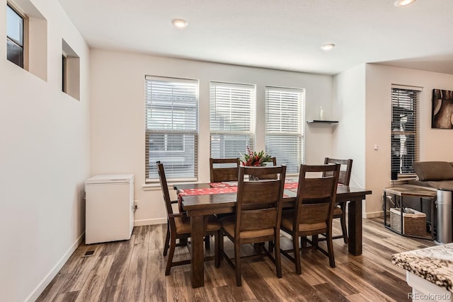 dining room featuring wood-type flooring