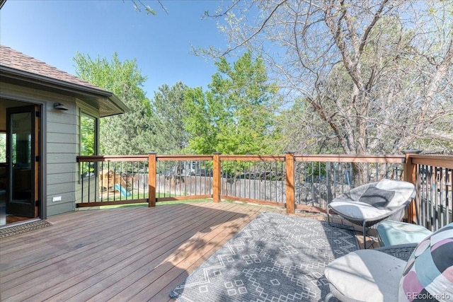 wooden deck featuring fence