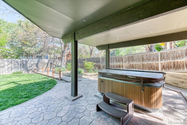 view of patio / terrace featuring a hot tub
