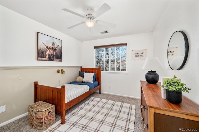 bedroom featuring ceiling fan and light colored carpet