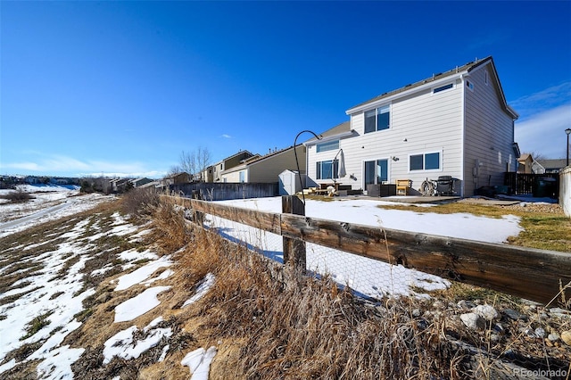 view of snow covered property