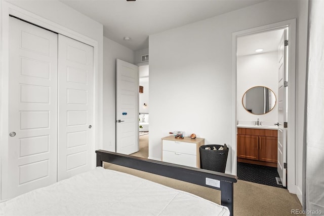9391 E 59th N Pl, Denver, CO 80238 - carpeted bedroom featuring a closet and ensuite bath