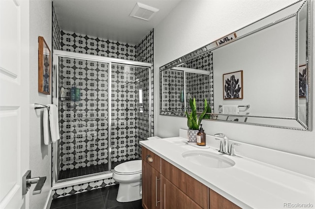 9391 E 59th N Pl, Denver, CO 80238 - full bathroom featuring vanity, tile patterned floors, and a shower stall