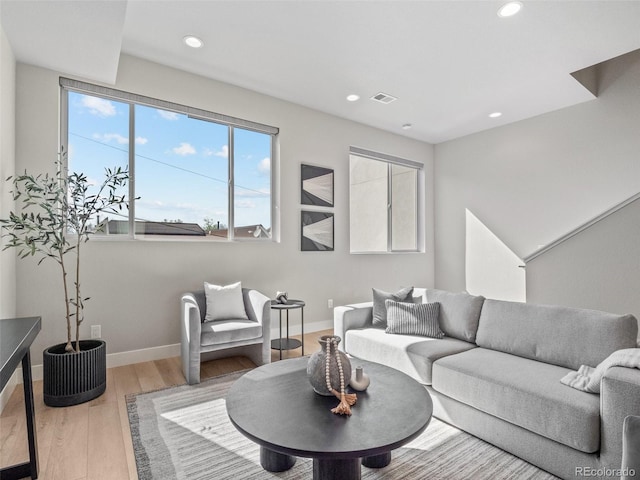 4733 E Iliff Ave, Denver, CO 80222 - living room with recessed lighting and wood finished floors