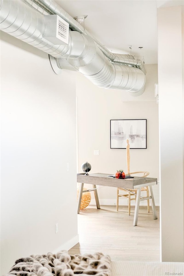 3198 Blake St Unit 502, Denver, CO 80205 - office with wood finished floors and baseboards