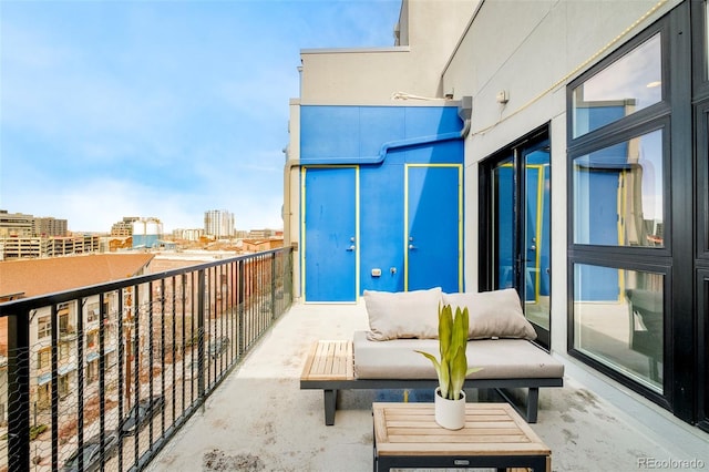 3198 Blake St Unit 502, Denver, CO 80205 - balcony with a view of city and an outdoor living space