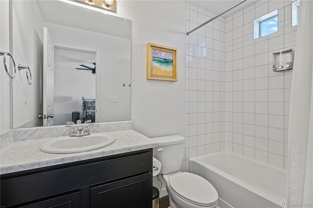 ensuite bathroom with connected bathroom, vanity, toilet, and shower / bathtub combination with curtain