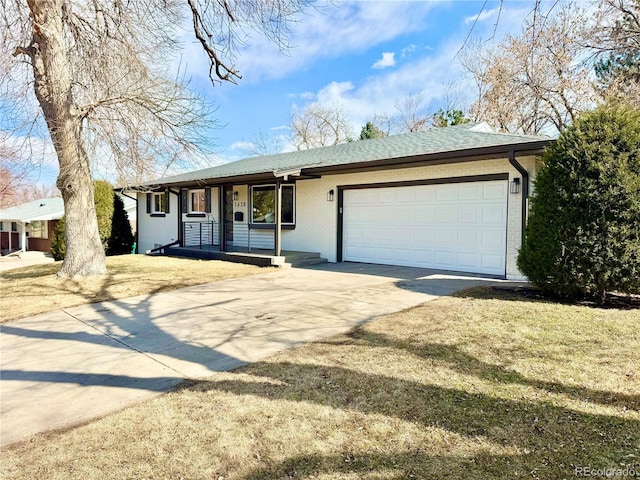 ranch-style home featuring brick siding, a shingled roof, covered porch, an attached garage, and driveway