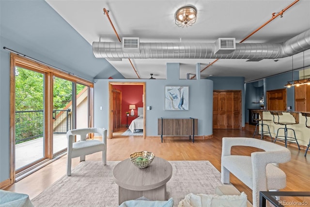 3299 Lowell Blvd Unit 204, Denver, CO 80211 - living room featuring wood finished floors and baseboards