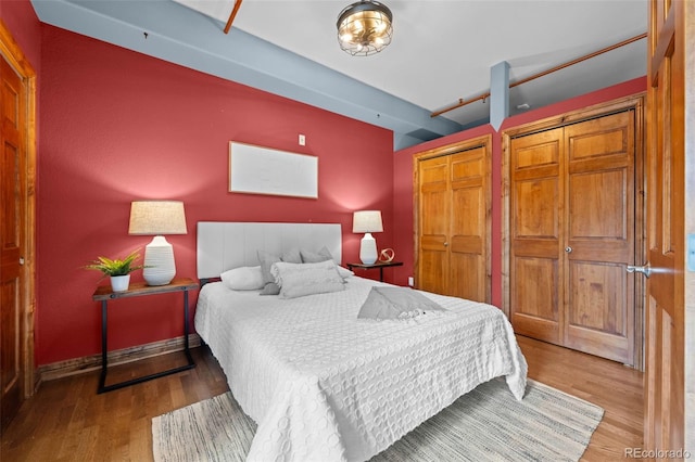 3299 Lowell Blvd Unit 204, Denver, CO 80211 - bedroom with wood finished floors and two closets