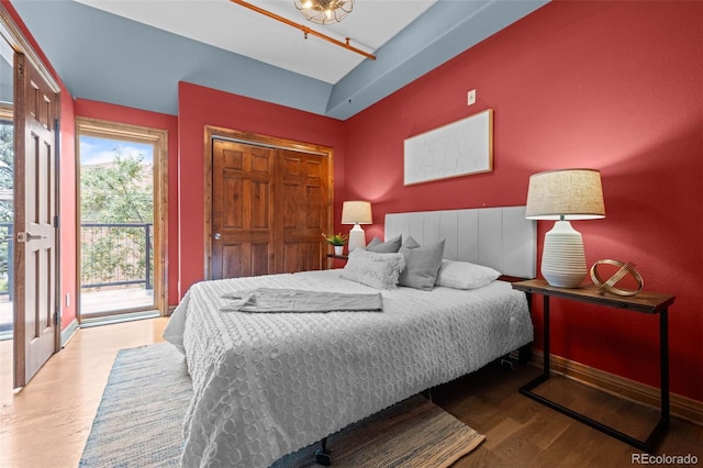 3299 Lowell Blvd Unit 204, Denver, CO 80211 - bedroom with access to exterior, wood finished floors, and a closet