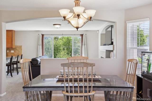 11866 High Desert Rd, Parker, CO 80134 - dining area featuring a chandelier and light carpet