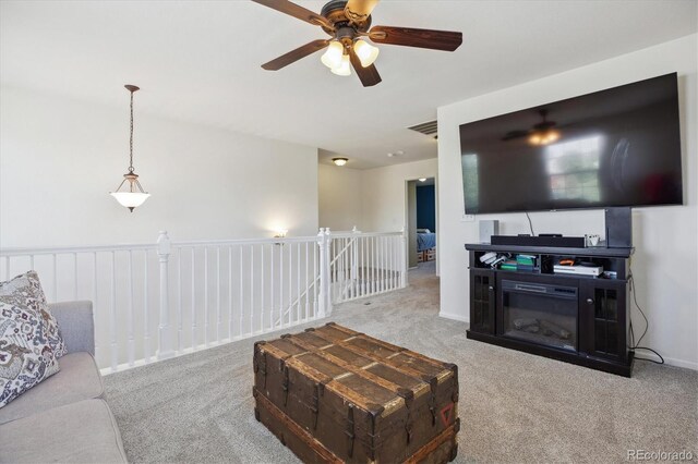11866 High Desert Rd, Parker, CO 80134 - carpeted living room with a ceiling fan