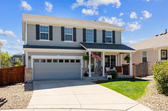 11866 High Desert Rd, Parker, CO 80134 - view of front of property with fence, driveway, and an attached garage