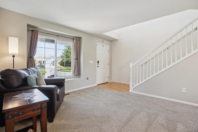 11866 High Desert Rd, Parker, CO 80134 - living room featuring light carpet, stairway, and baseboards