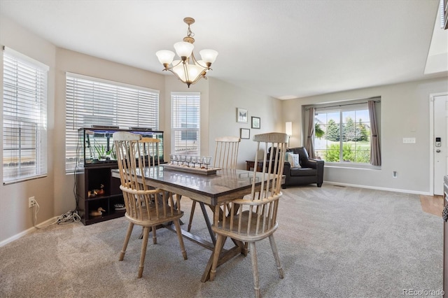 11866 High Desert Rd, Parker, CO 80134 - dining room with carpet floors, a chandelier, and baseboards