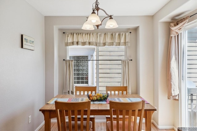 11866 High Desert Rd, Parker, CO 80134 - dining room featuring a chandelier and baseboards