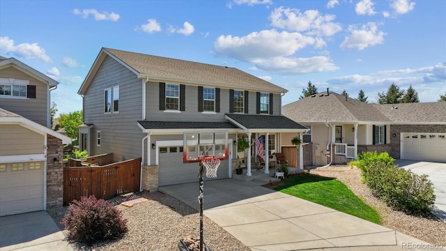 11866 High Desert Rd, Parker, CO 80134 - view of front of property featuring covered porch, concrete driveway, a garage, brick siding, and a shingled roof