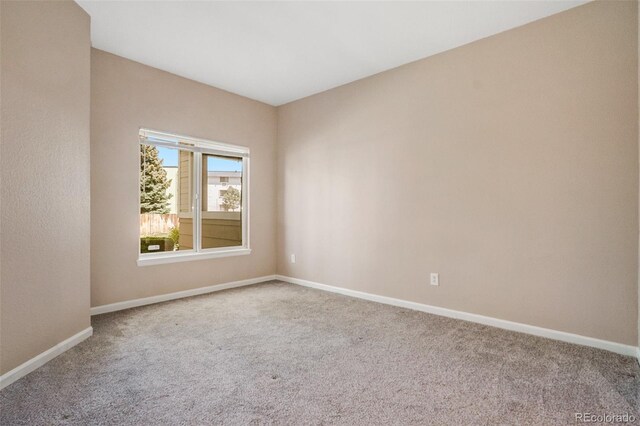8707 E Florida Ave Unit 709, Denver, CO 80247 - carpeted spare room with baseboards